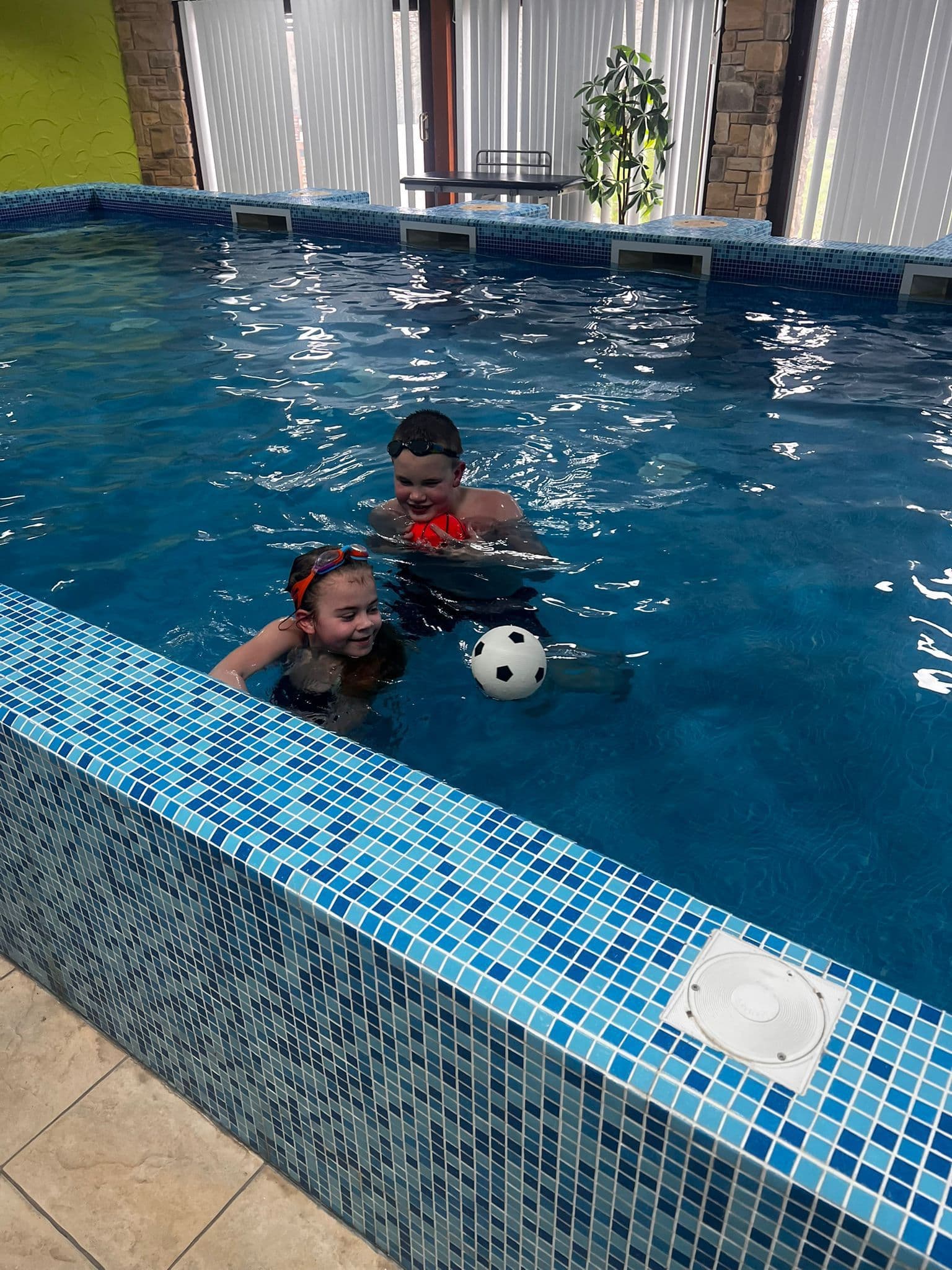Children enjoying a hydrotherapy pool session together